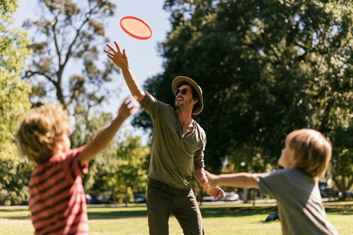 Park picnic with a wicker hamper on the grass — the family trip a planned $5,000 loan made possible